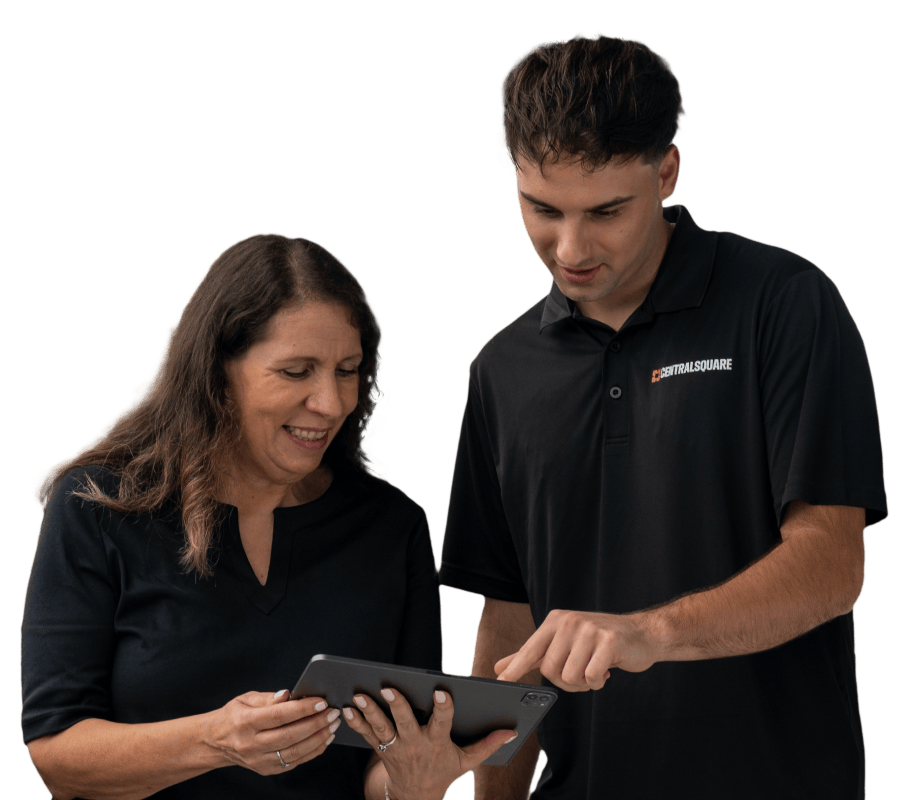 A centralsquare employee and customer looking at a tablet together